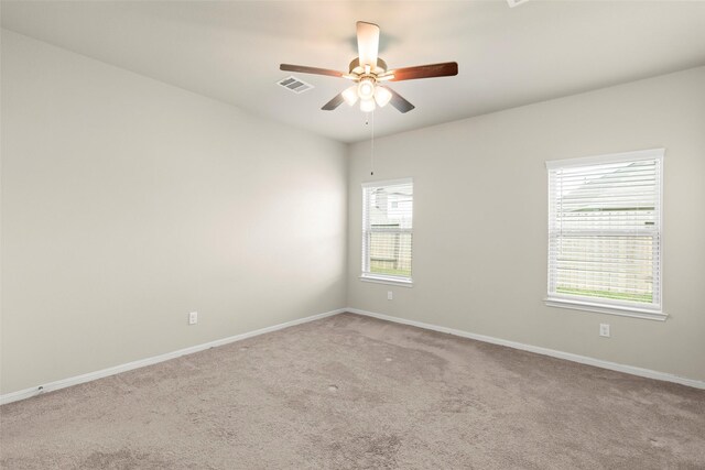 1333 Red Hills Dr, Rosharon, TX 77583 - unfurnished room with carpet flooring, baseboards, and a ceiling fan