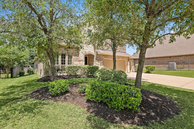 obstructed view of property with fence, a front lawn, driveway, stone siding, and brick siding
