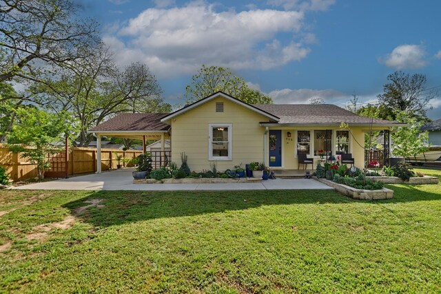 905 Clinton, Brenham, TX 77833 - view of front of house featuring a porch, an attached carport, and a shingled roof