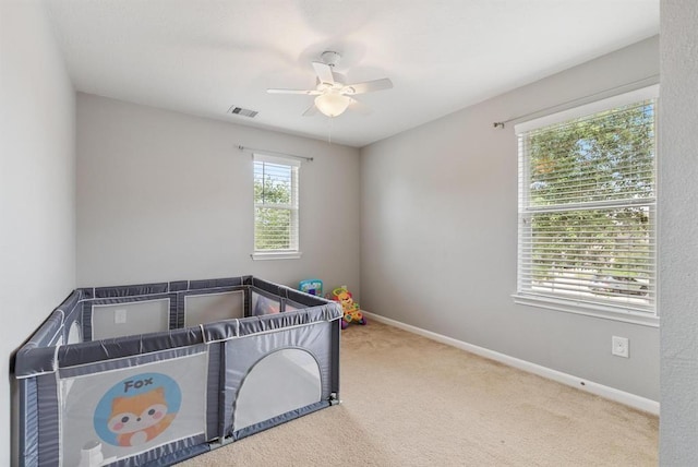 8206 Caldera Ln, Cypress, TX 77433 - carpeted bedroom featuring ceiling fan, baseboards, and visible vents