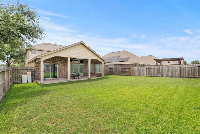 8206 Caldera Ln, Cypress, TX 77433 - rear view of property featuring a fenced backyard and a yard