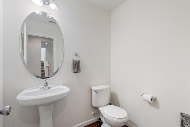 8206 Caldera Ln, Cypress, TX 77433 - half bath with toilet, visible vents, and baseboards