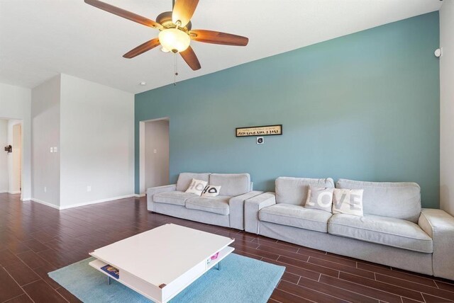 8206 Caldera Ln, Cypress, TX 77433 - living area with dark wood finished floors, ceiling fan, and baseboards