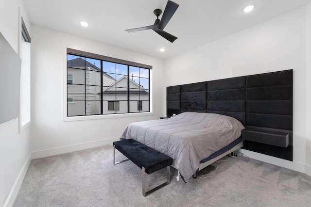 carpeted bedroom with recessed lighting, baseboards, and a ceiling fan