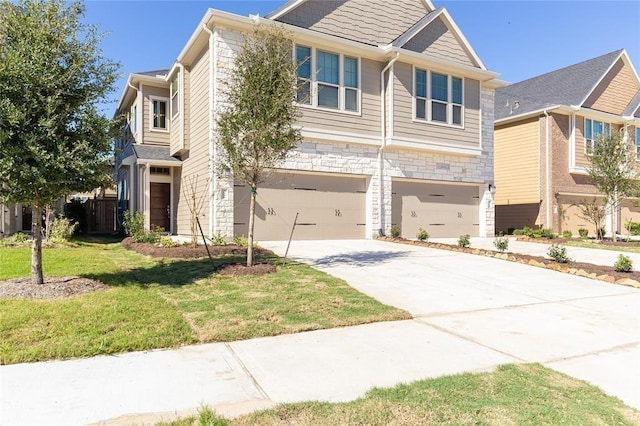 5546 Sallow Bay Ln, Fulshear, TX 77441 - view of front facade with stone siding, driveway, a front yard, and a garage