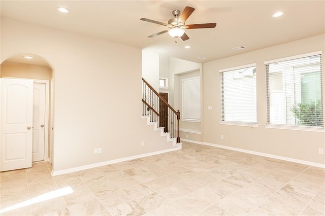 5546 Sallow Bay Ln, Fulshear, TX 77441 - unfurnished room featuring ceiling fan, arched walkways, and recessed lighting