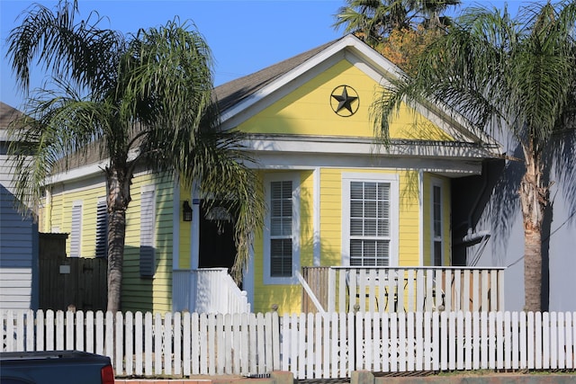 view of front of home with fence