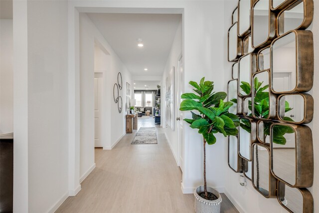 406 Robin St, Angleton, TX 77515 - hallway with light wood-type flooring, recessed lighting, and baseboards