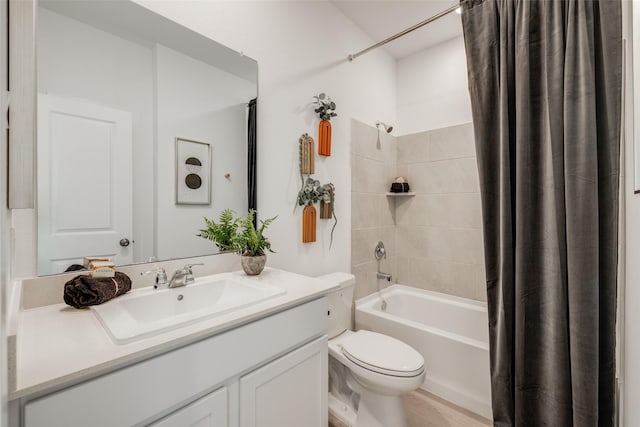 406 Robin St, Angleton, TX 77515 - bathroom with toilet, vanity, and shower / tub combo with curtain