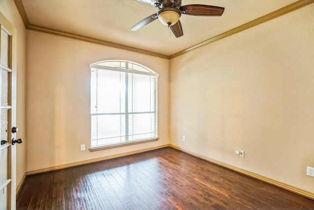 unfurnished room featuring hardwood / wood-style flooring, ceiling fan, and crown molding