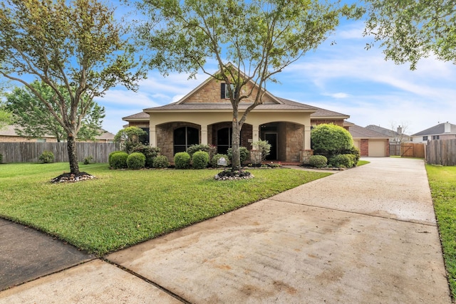view of front of home featuring stone siding, a front lawn, and fence
