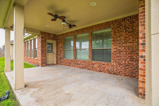 view of patio featuring ceiling fan