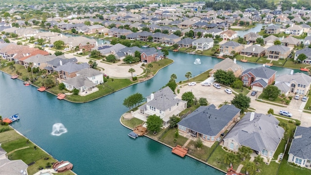 aerial view featuring a water view and a residential view
