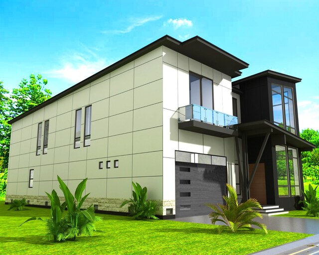 view of side of home with an attached garage, a lawn, and a balcony