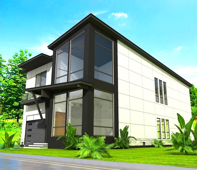 view of home's exterior with a yard