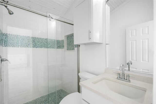 bathroom with wooden ceiling, a shower stall, toilet, and vanity