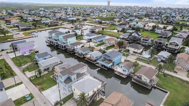 birds eye view of property featuring a residential view and a water view