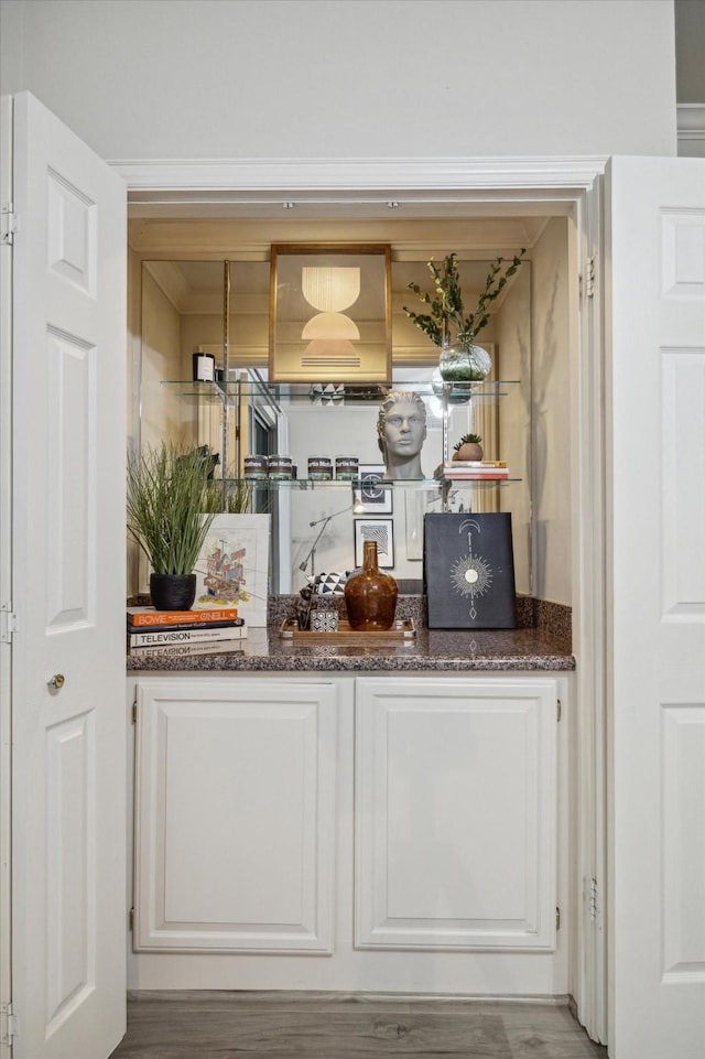 2111 Welch St Unit A219, Houston, TX 77019 - bar with wood finished floors