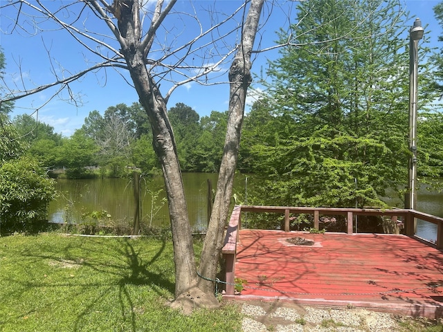 381 Lakeshore Dr, Cleveland, TX 77327 - wooden terrace featuring a water view
