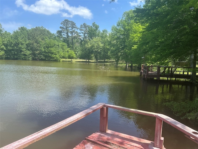 381 Lakeshore Dr, Cleveland, TX 77327 - view of dock with a water view