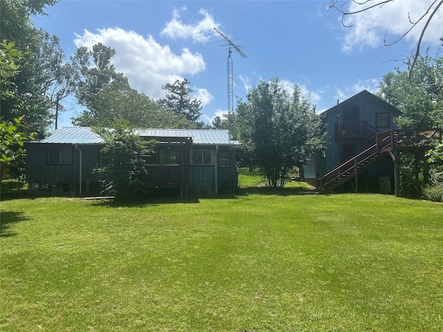381 Lakeshore Dr, Cleveland, TX 77327 - view of yard featuring stairs
