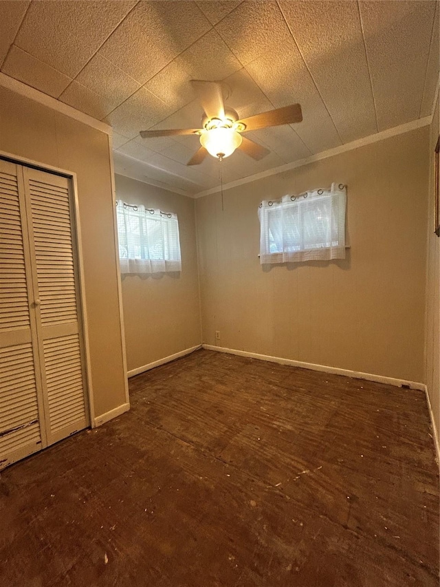381 Lakeshore Dr, Cleveland, TX 77327 - unfurnished bedroom featuring crown molding, wood finished floors, a closet, ceiling fan, and baseboards