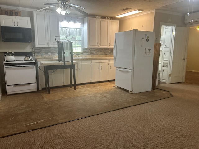 381 Lakeshore Dr, Cleveland, TX 77327 - kitchen with backsplash, white cabinetry, ceiling fan, and white appliances