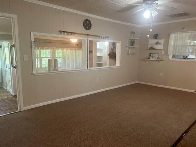 381 Lakeshore Dr, Cleveland, TX 77327 - unfurnished room with carpet flooring, visible vents, baseboards, ceiling fan, and ornamental molding
