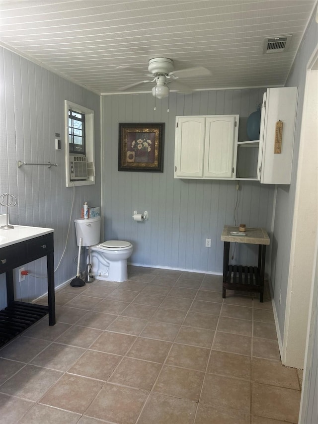 381 Lakeshore Dr, Cleveland, TX 77327 - bathroom featuring toilet, a ceiling fan, tile patterned floors, and visible vents