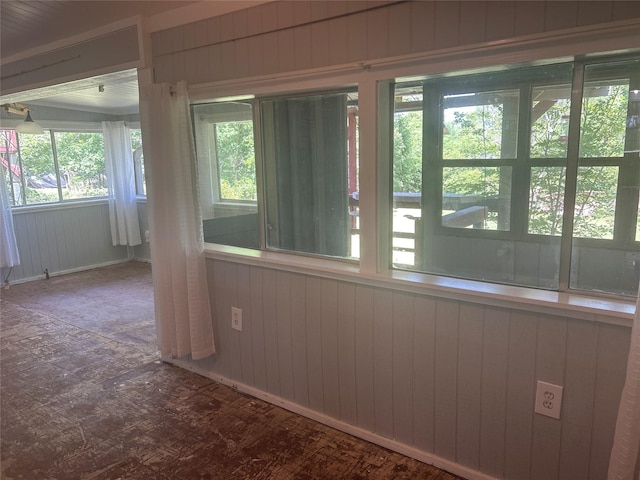 381 Lakeshore Dr, Cleveland, TX 77327 - unfurnished sunroom featuring wood walls