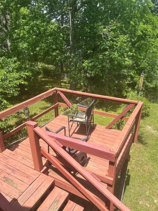 381 Lakeshore Dr, Cleveland, TX 77327 - wooden terrace with a yard