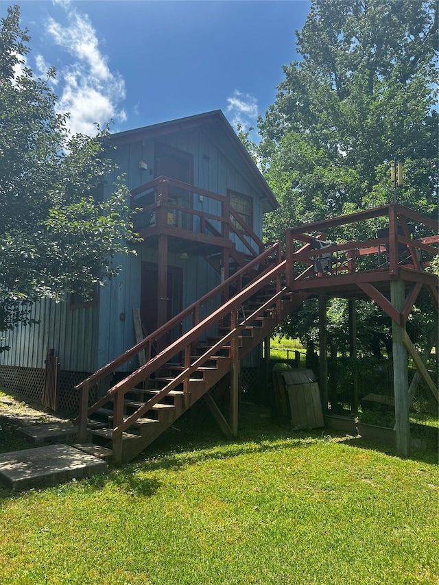 381 Lakeshore Dr, Cleveland, TX 77327 - exterior space with stairway, a lawn, and a deck