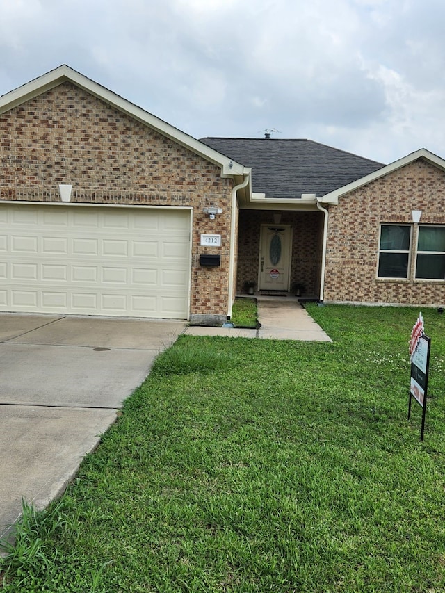 4212 Knoxville St, Houston, TX 77051 - ranch-style home with driveway, an attached garage, a front yard, brick siding, and roof with shingles