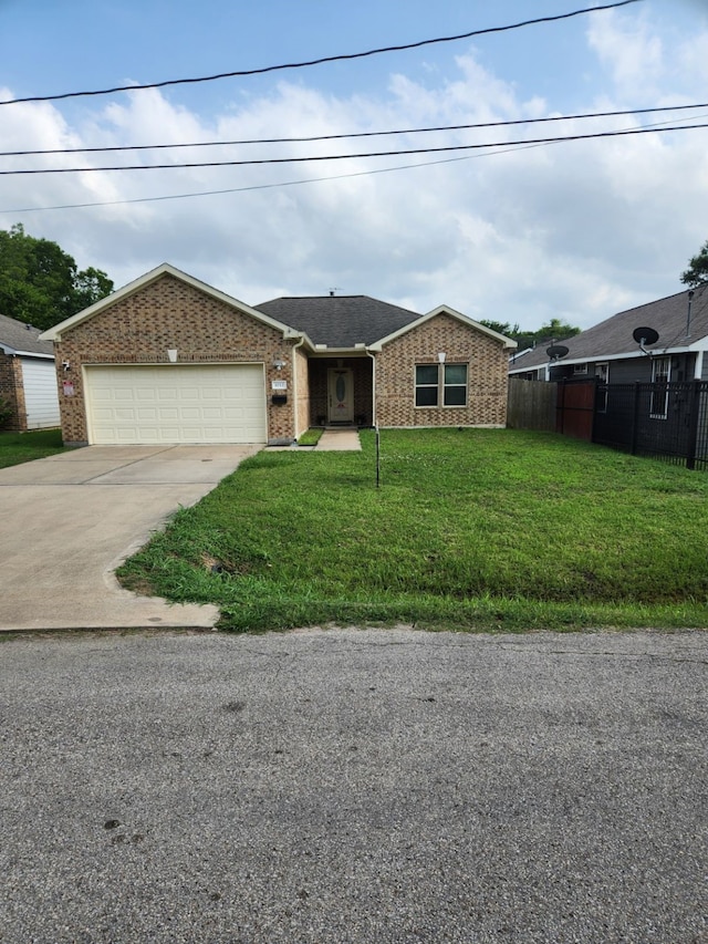 4212 Knoxville St, Houston, TX 77051 - ranch-style home featuring fence, a front lawn, concrete driveway, brick siding, and a garage