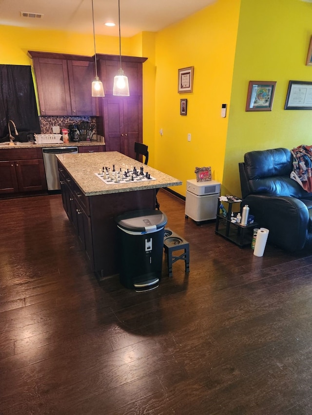 4212 Knoxville St, Houston, TX 77051 - kitchen featuring tasteful backsplash, a sink, a breakfast bar, dishwasher, and visible vents