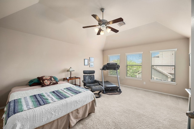 carpeted bedroom featuring lofted ceiling, visible vents, a ceiling fan, and baseboards