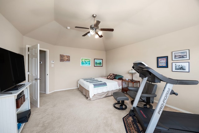 bedroom with light colored carpet, ceiling fan, baseboards, and lofted ceiling