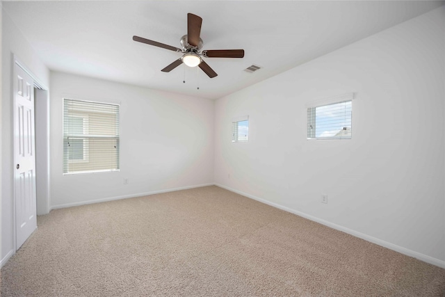 9939 Chimney Swift Ln, Conroe, TX 77385 - unfurnished room featuring light colored carpet and ceiling fan