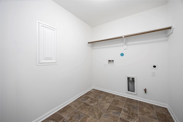 9939 Chimney Swift Ln, Conroe, TX 77385 - washroom with gas dryer hookup, hookup for an electric dryer, washer hookup, and stone finish floors