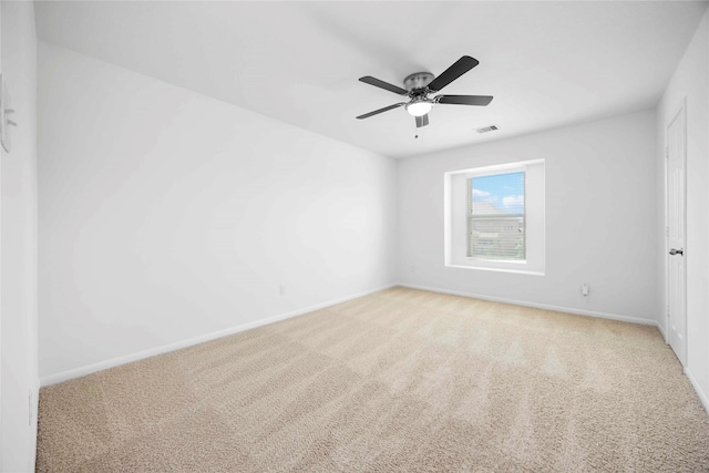 9939 Chimney Swift Ln, Conroe, TX 77385 - carpeted empty room with baseboards and a ceiling fan