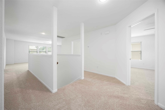 9939 Chimney Swift Ln, Conroe, TX 77385 - hallway featuring carpet and an upstairs landing