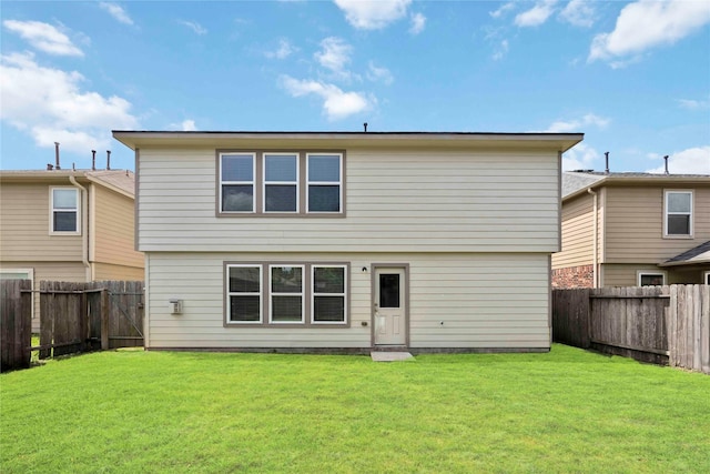 9939 Chimney Swift Ln, Conroe, TX 77385 - back of house featuring a fenced backyard