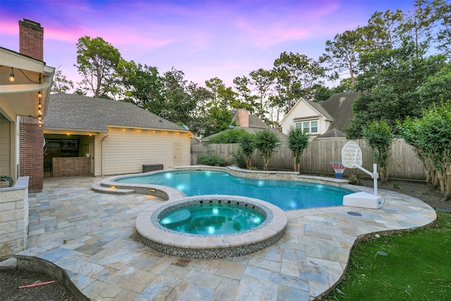 pool at dusk with a patio area, a fenced backyard, a fenced in pool, and an in ground hot tub