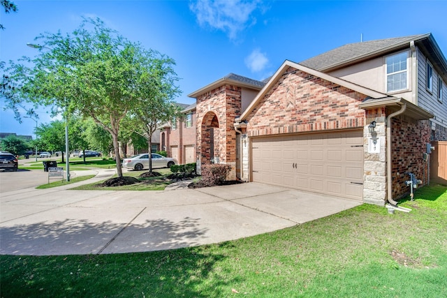 view of front of property featuring brick siding, roof with shingles, a front lawn, concrete driveway, and an attached garage