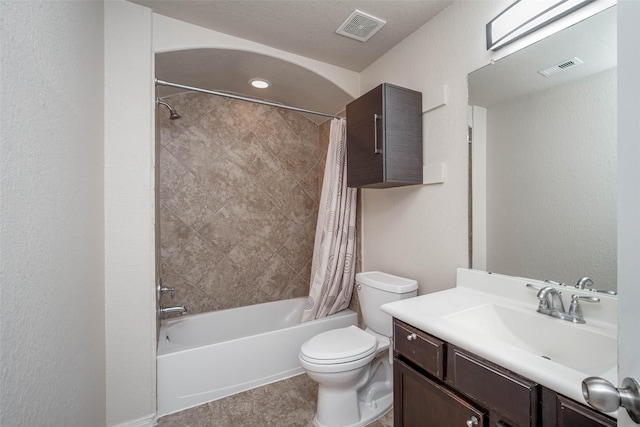 bathroom with shower / bath combo with shower curtain, toilet, visible vents, and vanity