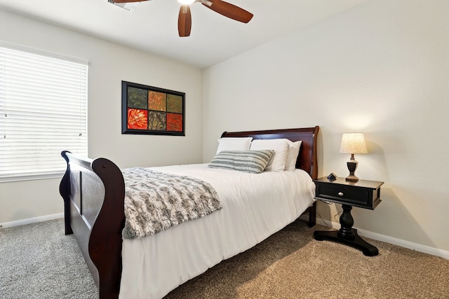 bedroom with baseboards, carpet, and ceiling fan
