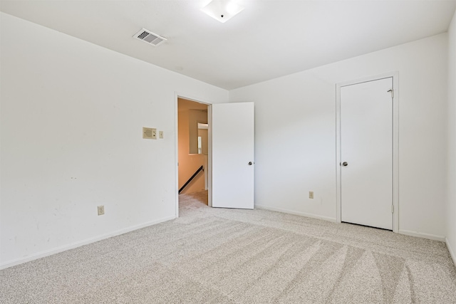 4206 Willow Hill Dr, Seabrook, TX 77586 - spare room with baseboards, light colored carpet, and visible vents