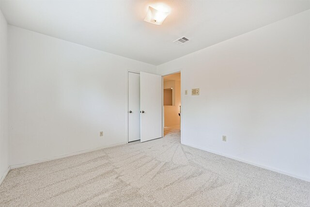 4206 Willow Hill Dr, Seabrook, TX 77586 - empty room with baseboards, light carpet, and visible vents
