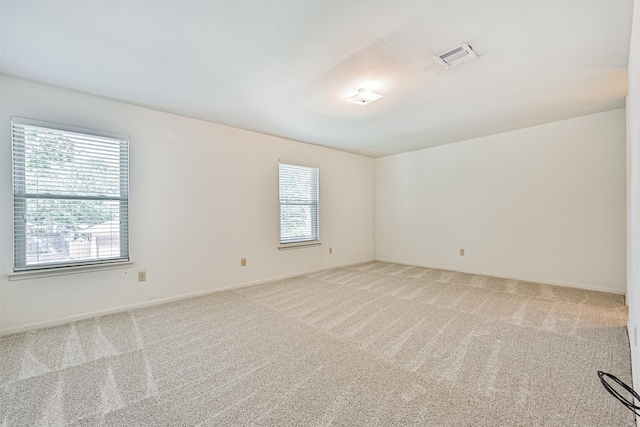 4206 Willow Hill Dr, Seabrook, TX 77586 - empty room featuring baseboards, visible vents, and light carpet