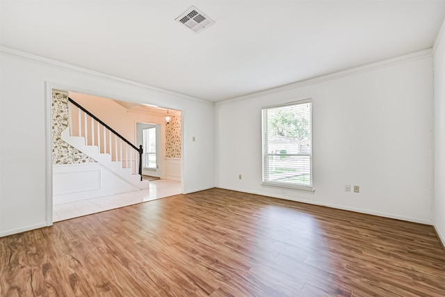4206 Willow Hill Dr, Seabrook, TX 77586 - interior space with visible vents, ornamental molding, and wood finished floors